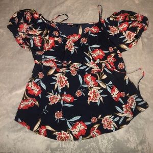 Cross-tied floral peplum shirt